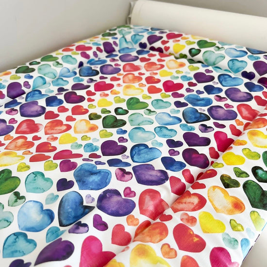 Load image into Gallery viewer, Rainbow Heart Print Changing Mat
