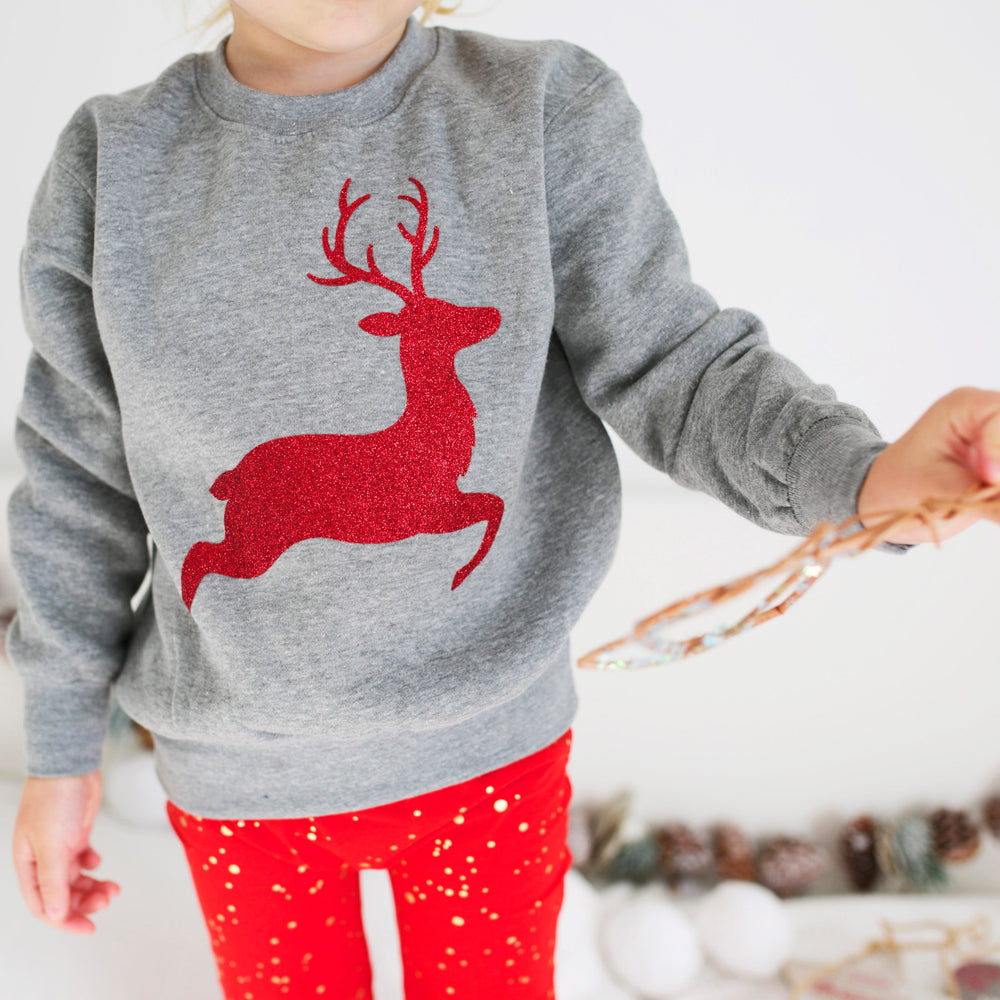 
                  
                    Sparkle Reindeer Grey sweater
                  
                